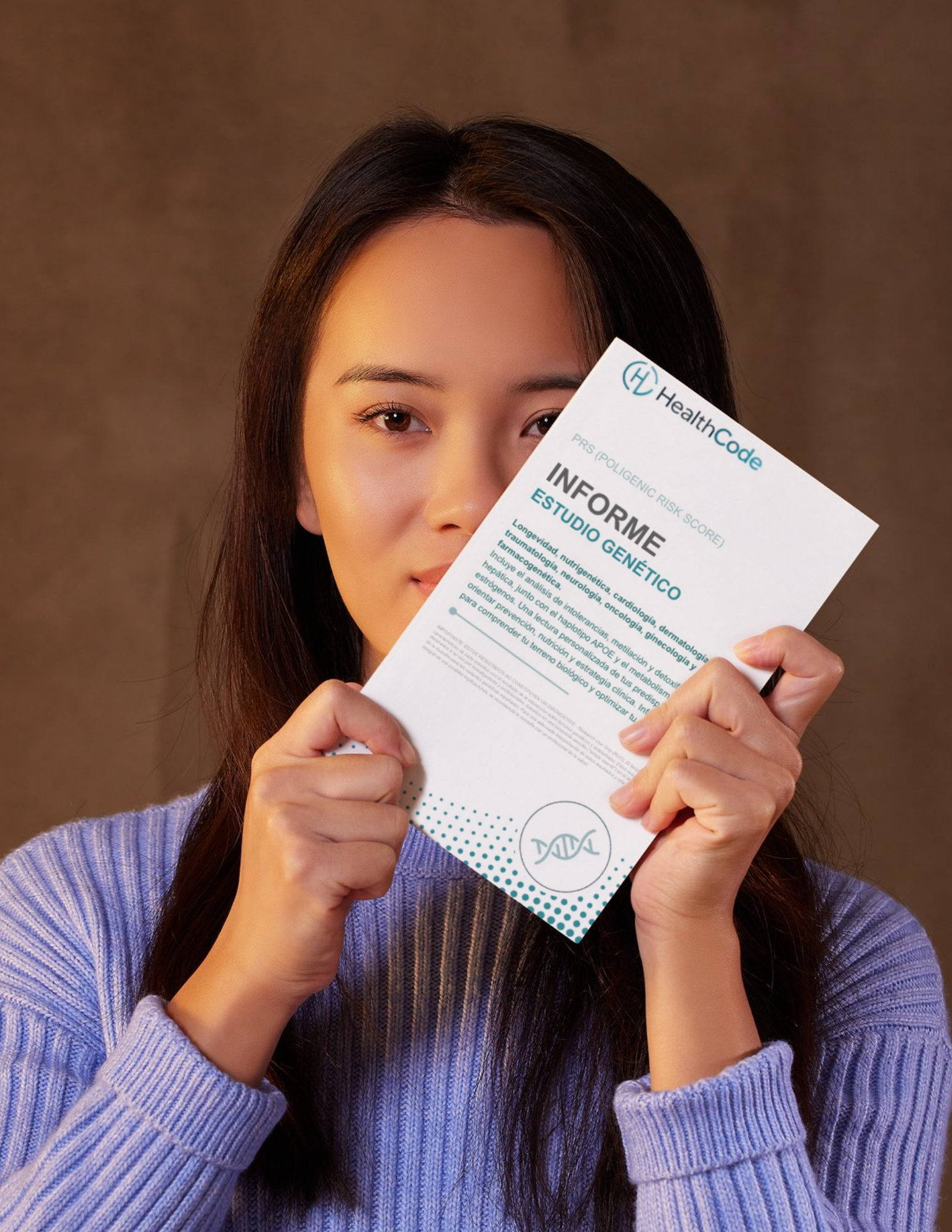 Person holding an illustrative Health Code genetic report